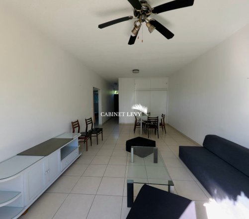 Appartement F3 au rez-de-jardin (Résidence bord de mer) à Arue - B11