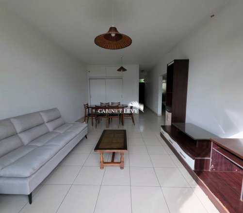 Appartement F3 au rez-de-jardin (Résidence bord de mer) à Arue - B14